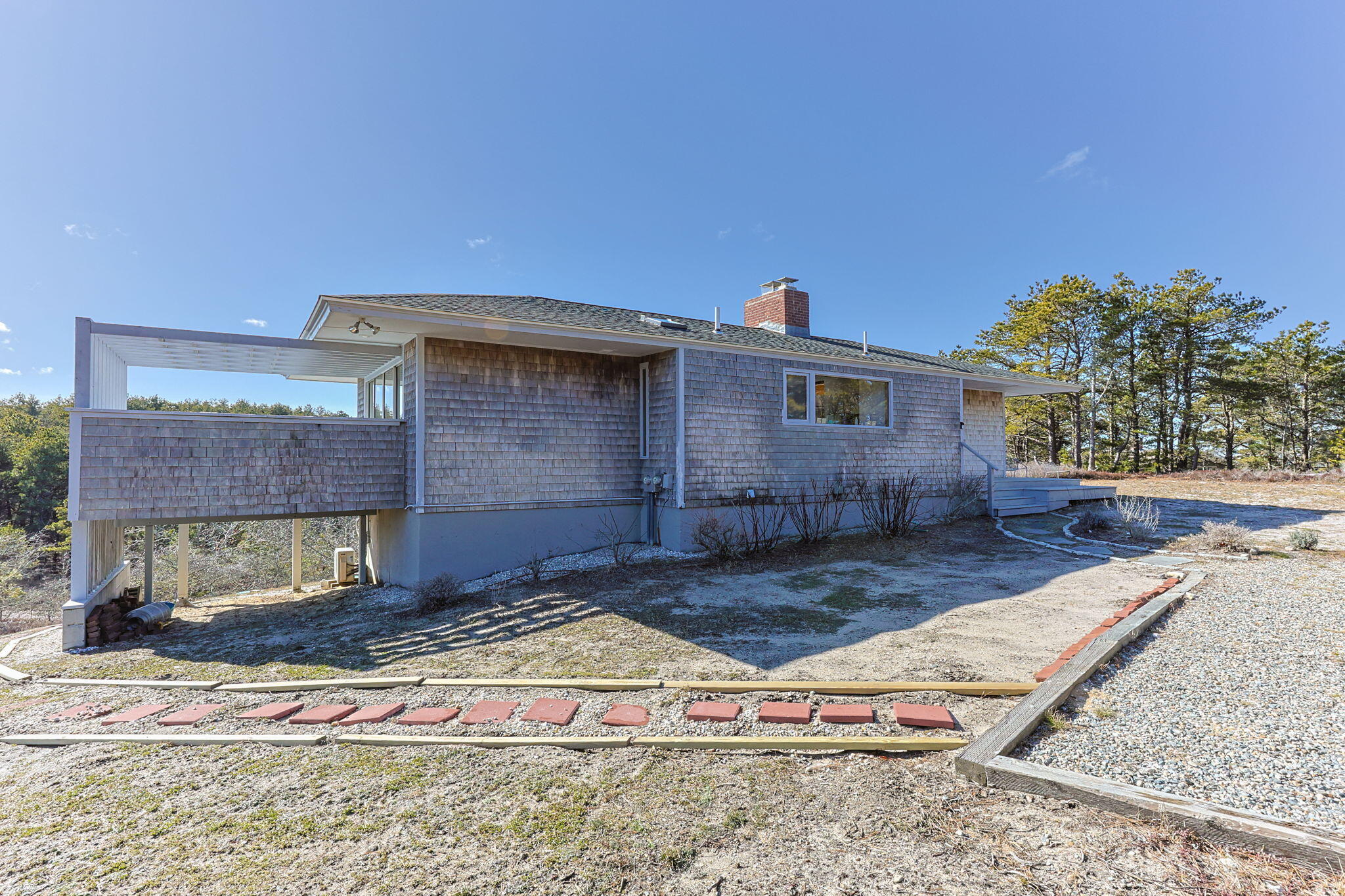2 Cobb Road Truro, MA 02666 - Photo 2 of 38 a view of a house with a yard