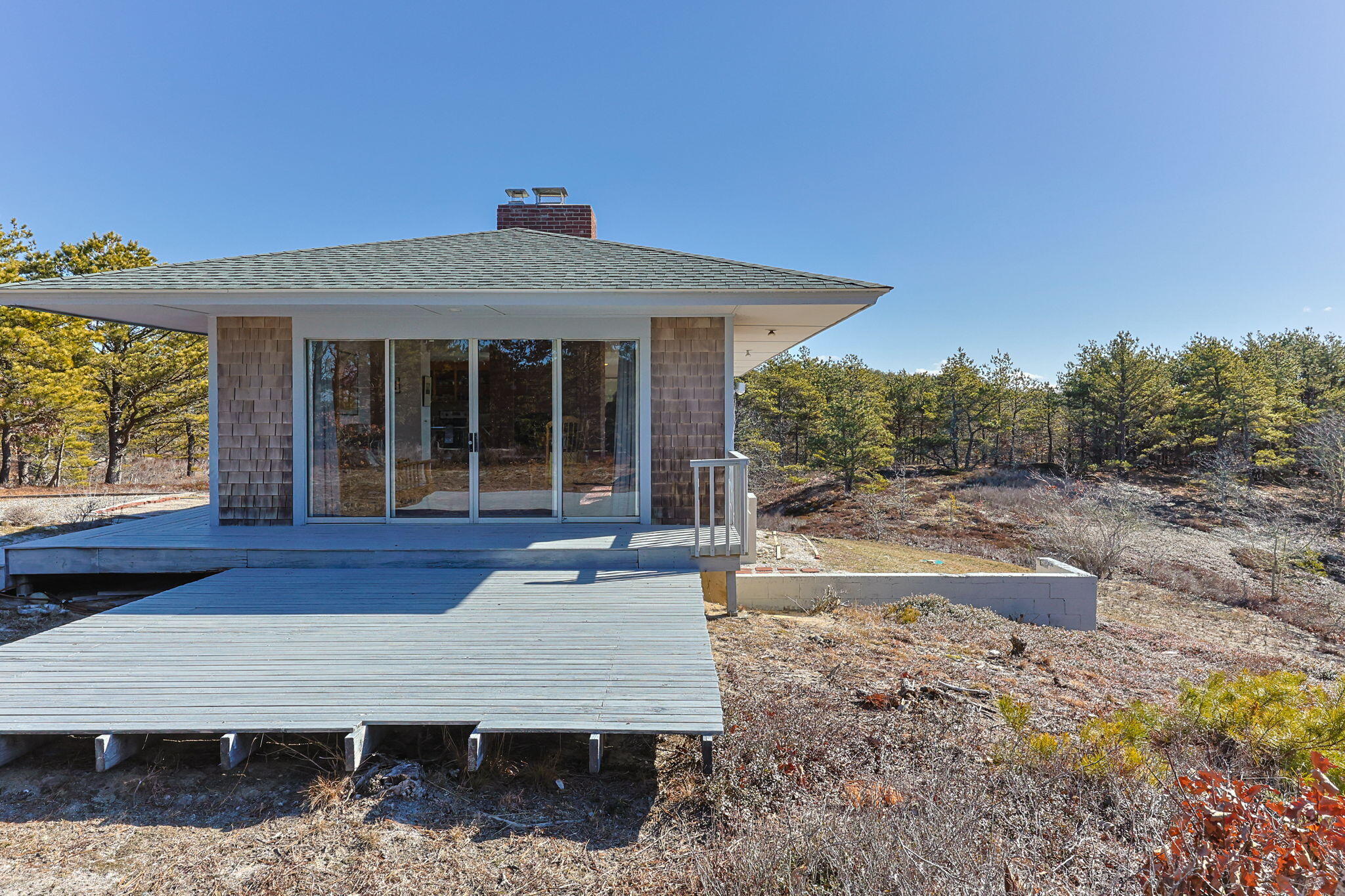 2 Cobb Road Truro, MA 02666 - Photo 28 of 38 a front view of a house with garden