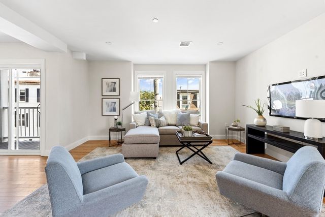 a car parked in front of a building