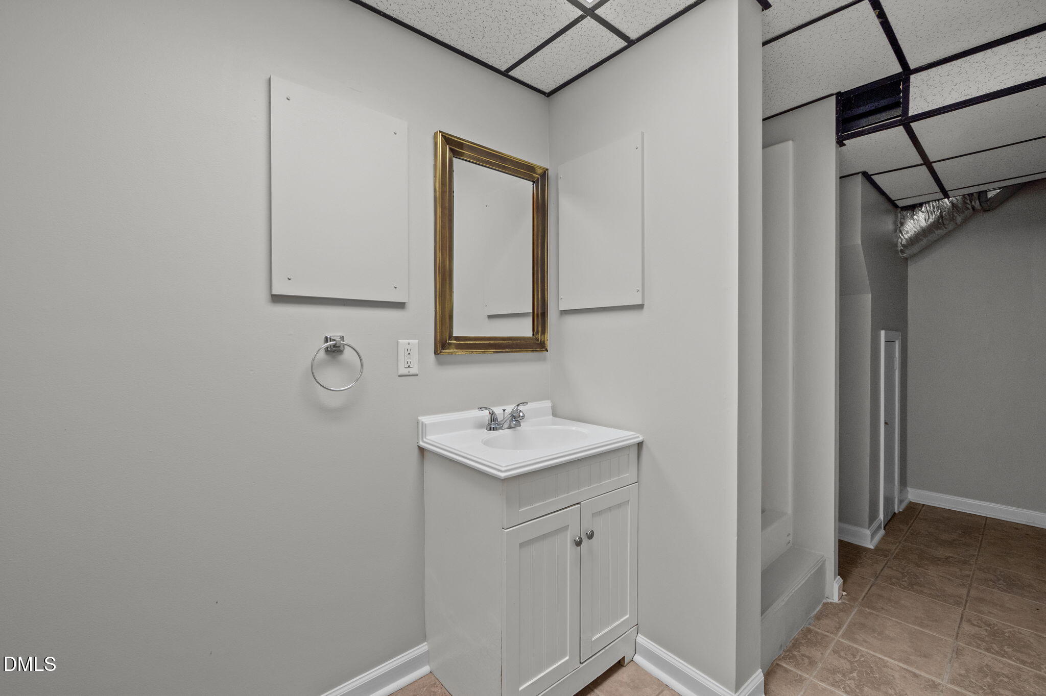 205 Roxdale Place Roxboro, NC 27574 - Photo 33 of 50 a bathroom with a sink toilet and mirror