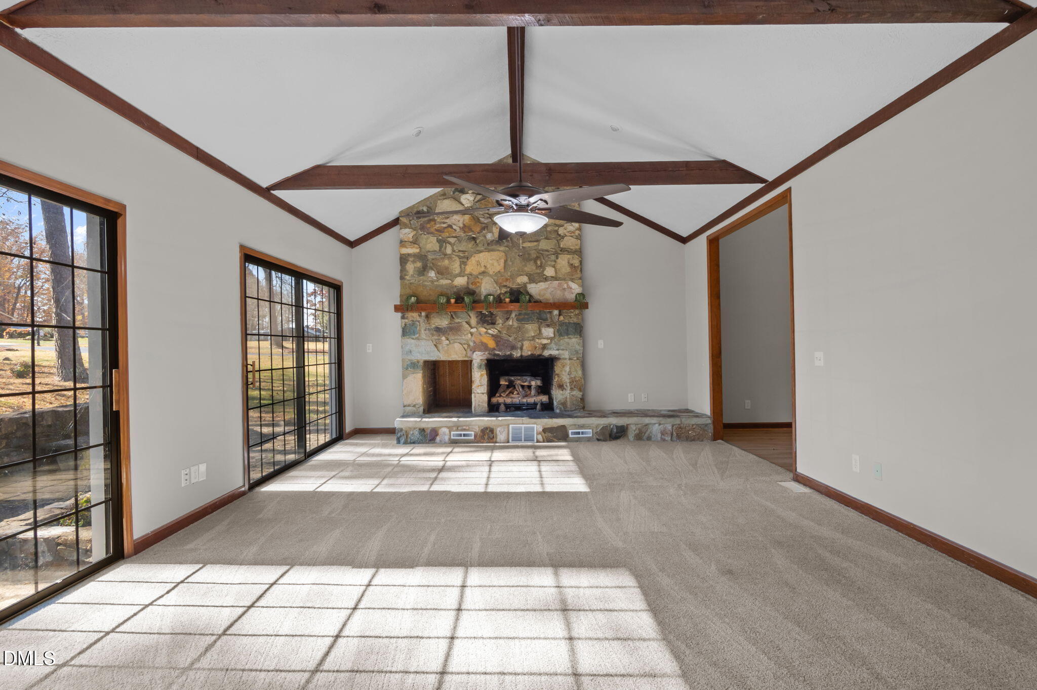 205 Roxdale Place Roxboro, NC 27574 - Photo 5 of 50 a view of an empty room with window and fireplace