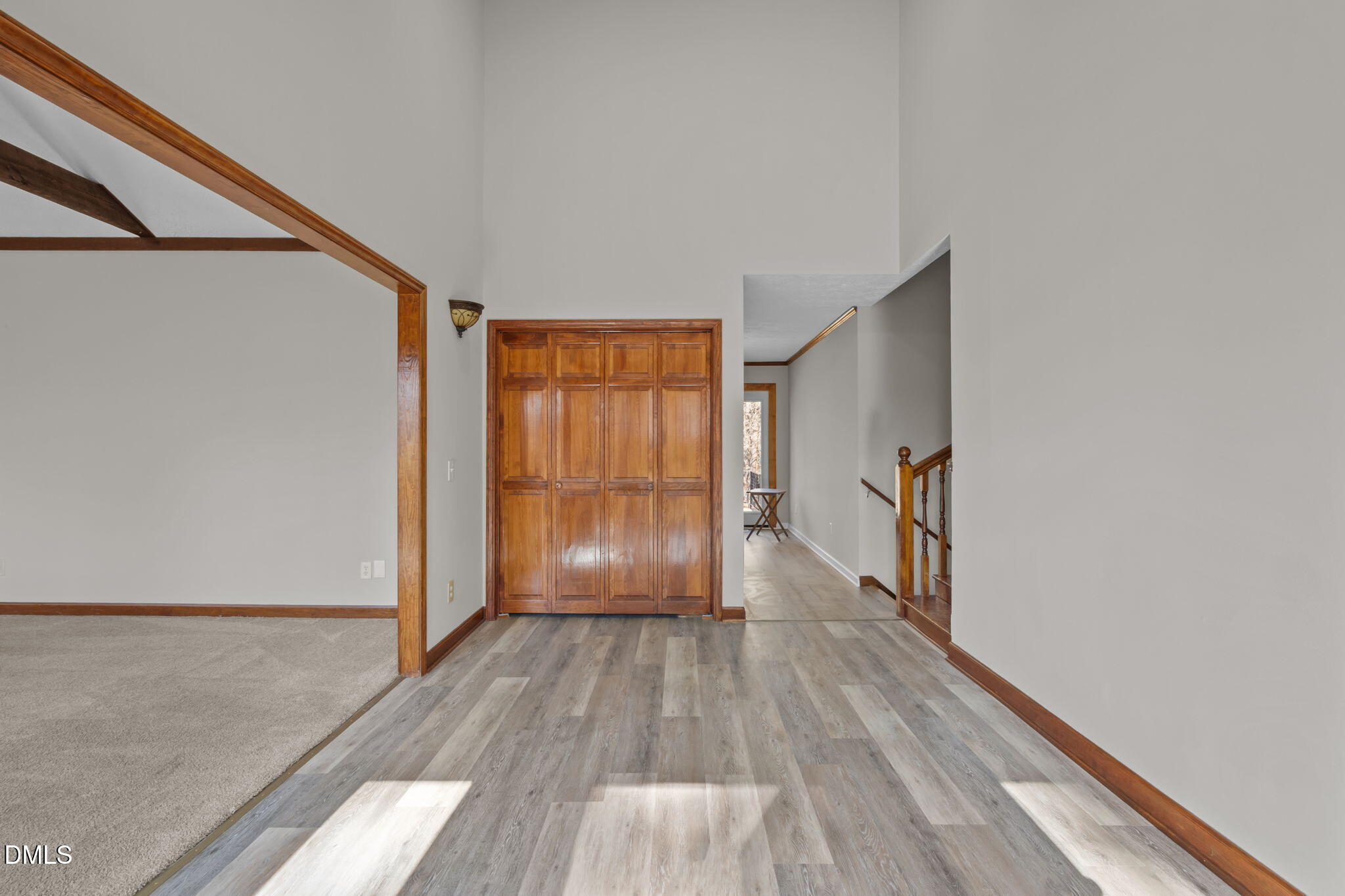 205 Roxdale Place Roxboro, NC 27574 - Photo 7 of 50 a view of hallway with a large window and wooden floor
