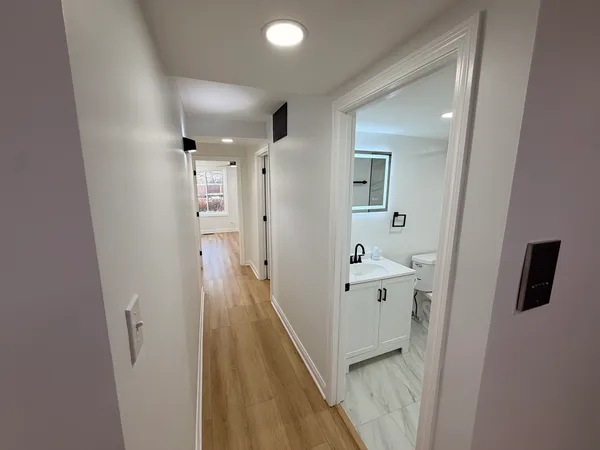 a bathroom with a sink and mirror