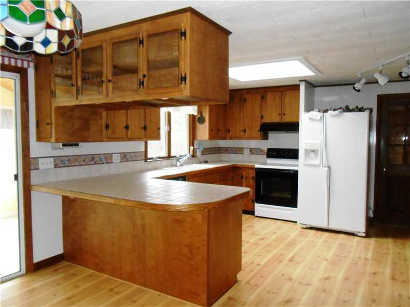 25 N Road Fayette, ME 04349 - Photo 5 of 14 Kitchen. skylight -sliding door goes...