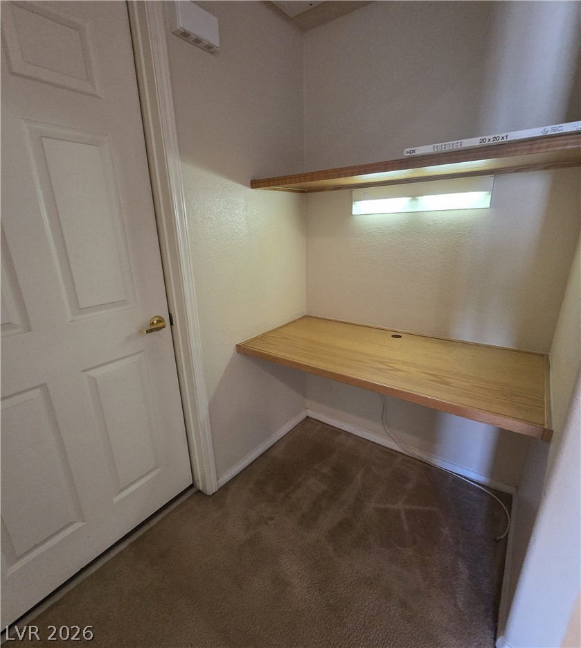 10550 West Alexander Road, Unit 2183 Las Vegas, NV 89129 - Photo 12 of 22 A well-lit, compact workspace provides an efficient area for productivity.