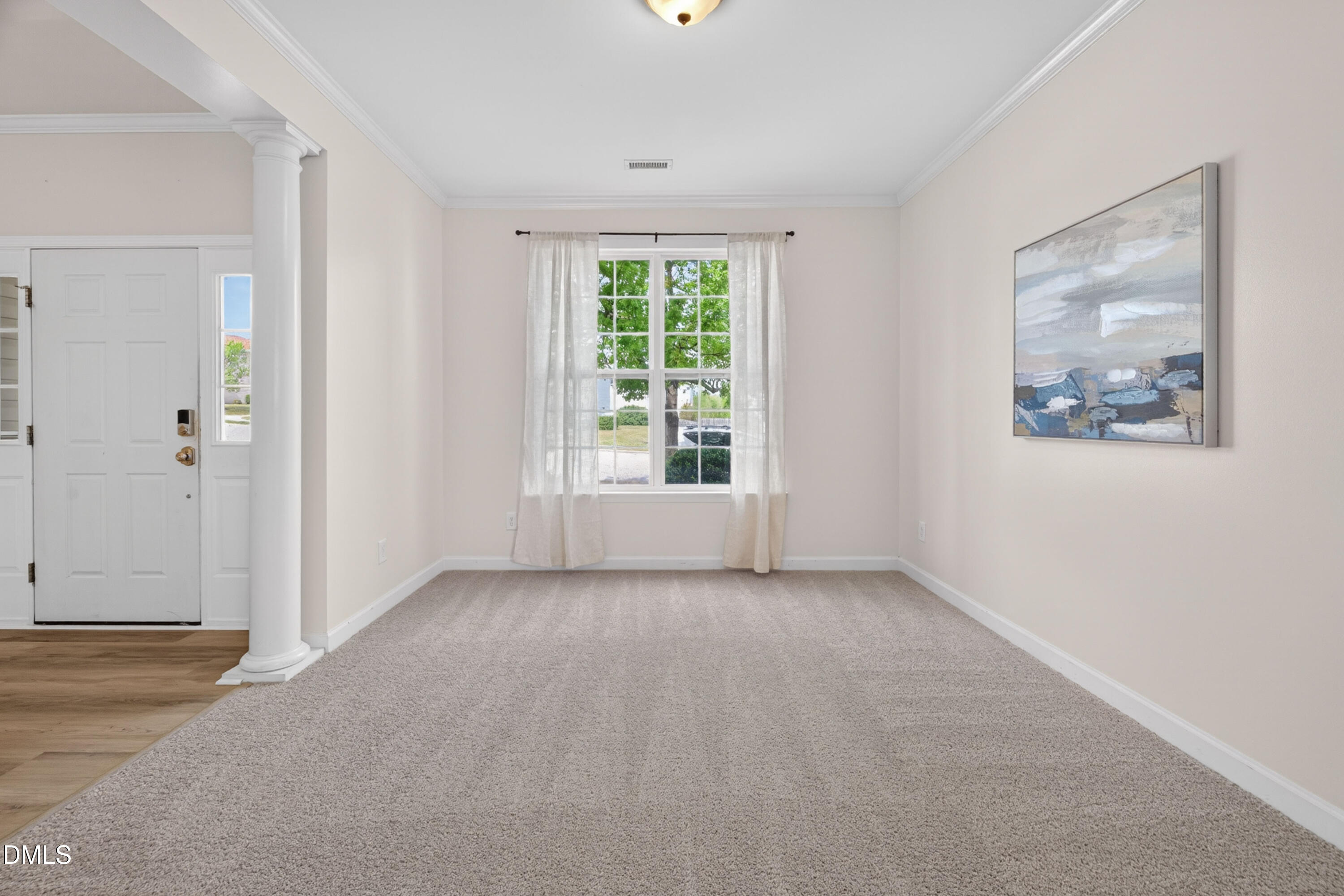 5304 Stone Station Drive Raleigh, NC 27616 - Photo 5 of 34 a view of an empty room with a window