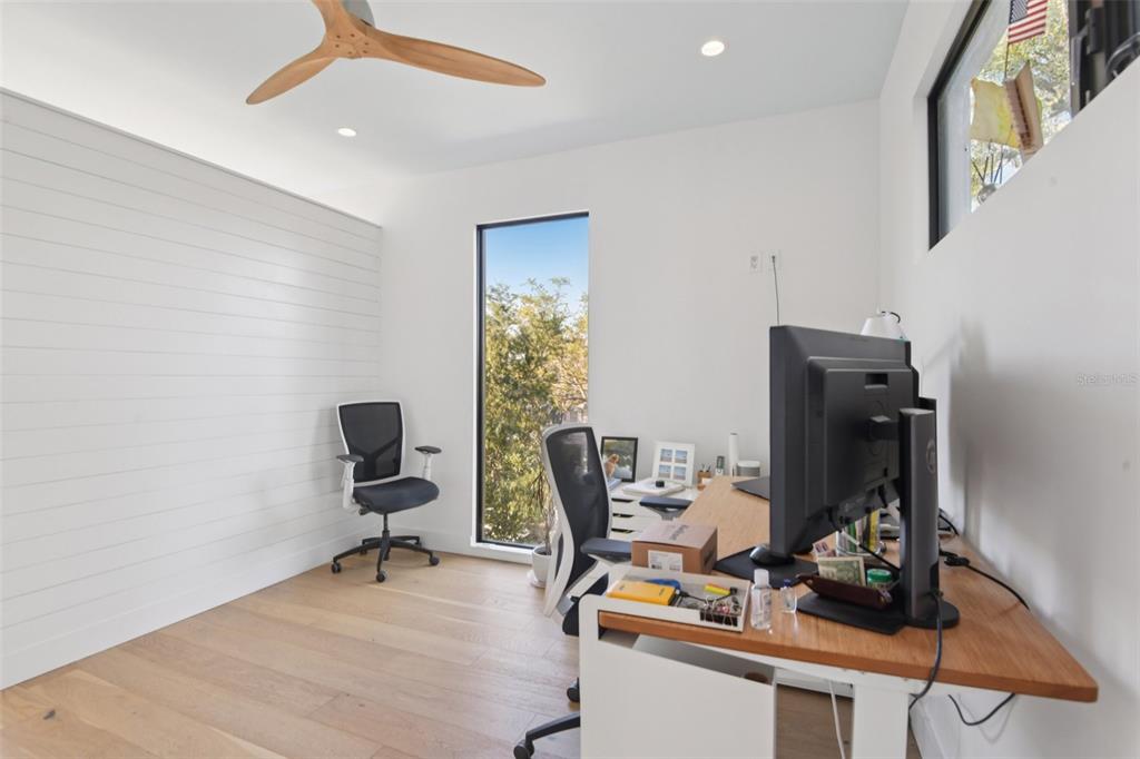 4828 West Flamingo Road Tampa, FL 33611 - Photo 45 of 67 a view of a workspace with furniture