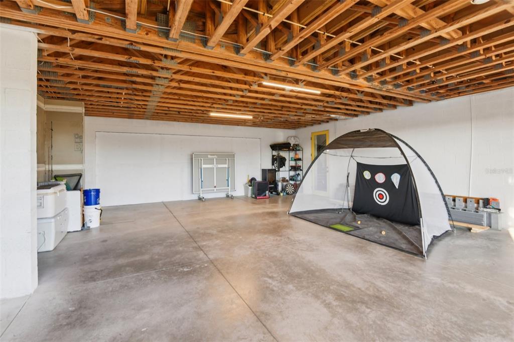 4828 West Flamingo Road Tampa, FL 33611 - Photo 54 of 67 a view of a room with a flat screen tv