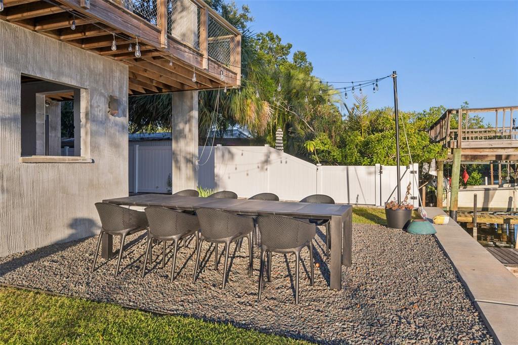 4828 West Flamingo Road Tampa, FL 33611 - Photo 58 of 67 a view of an outdoor sitting area with furniture