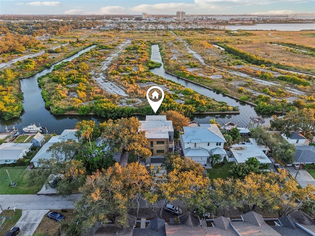 4828 West Flamingo Road Tampa, FL 33611 - Photo 59 of 67 an aerial view of residential building with outdoor space and ocean view