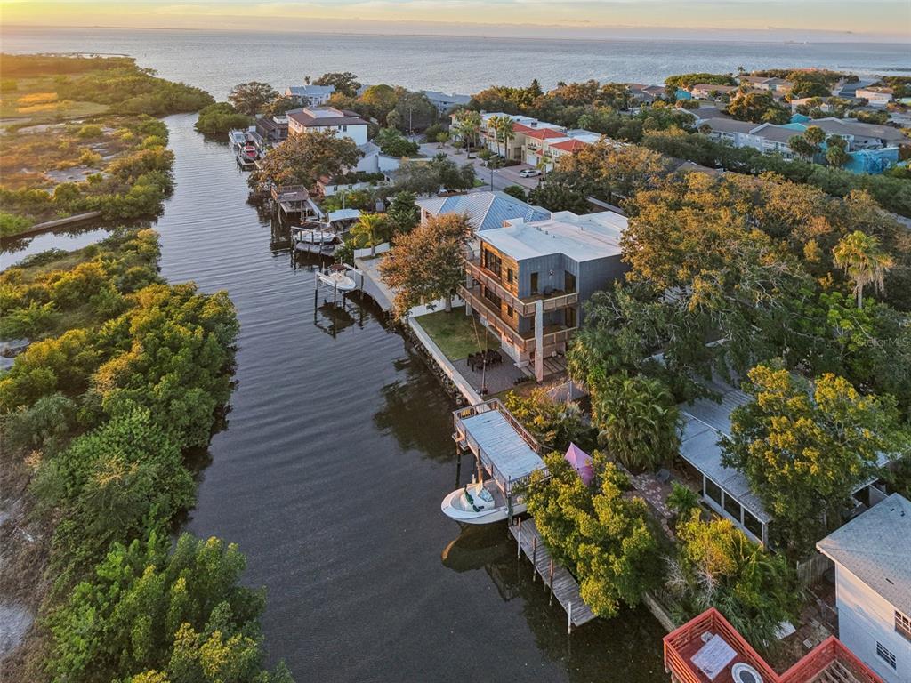4828 West Flamingo Road Tampa, FL 33611 - Photo 60 of 67 an aerial view of house with yard space and ocean view