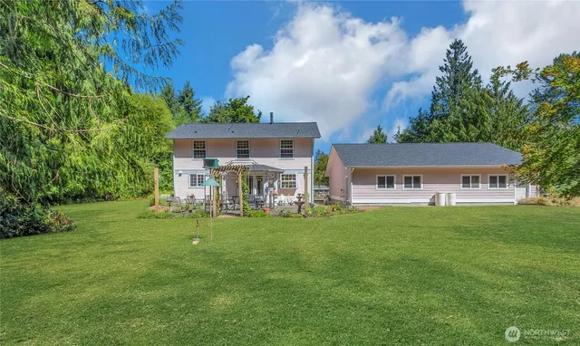 a view of a big yard next to a house