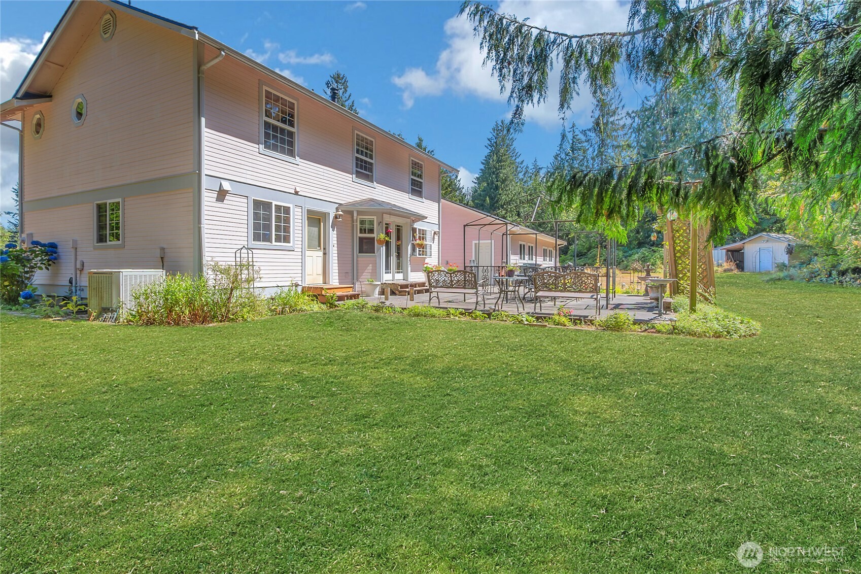 27210 145th Street East Buckley, WA 98321 - Photo 28 of 31 a front view of a house with garden