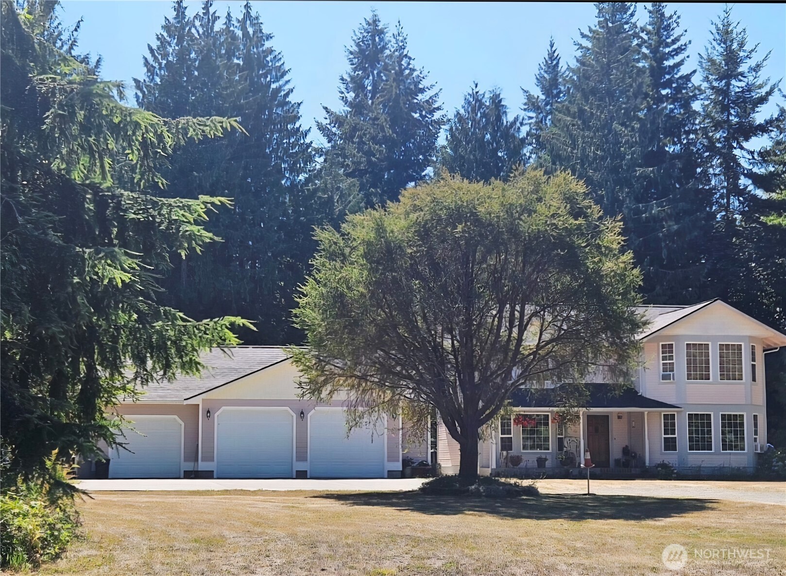 27210 145th Street East Buckley, WA 98321 - Photo 5 of 31 a front view of a house with a yard
