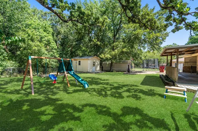 a view of a park with a slide