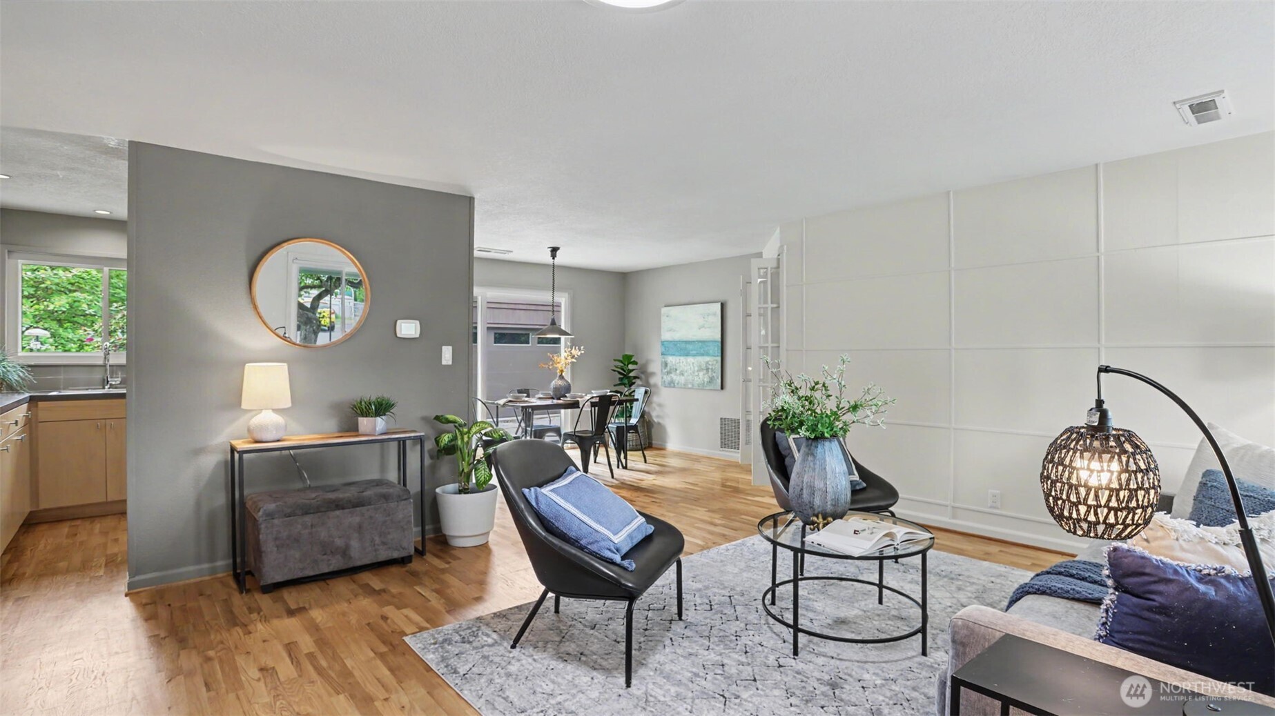 12515 Southeast 171st Street Renton, WA 98058 - Photo 6 of 24 a living room with furniture a table and a potted plant