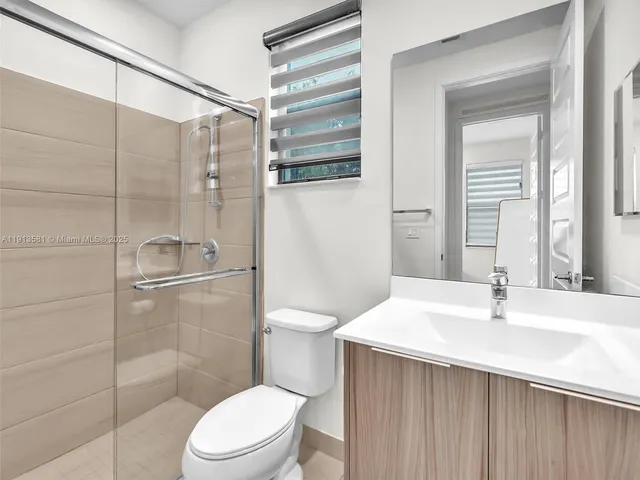 a view of a livingroom with furniture and a livingroom with furniture