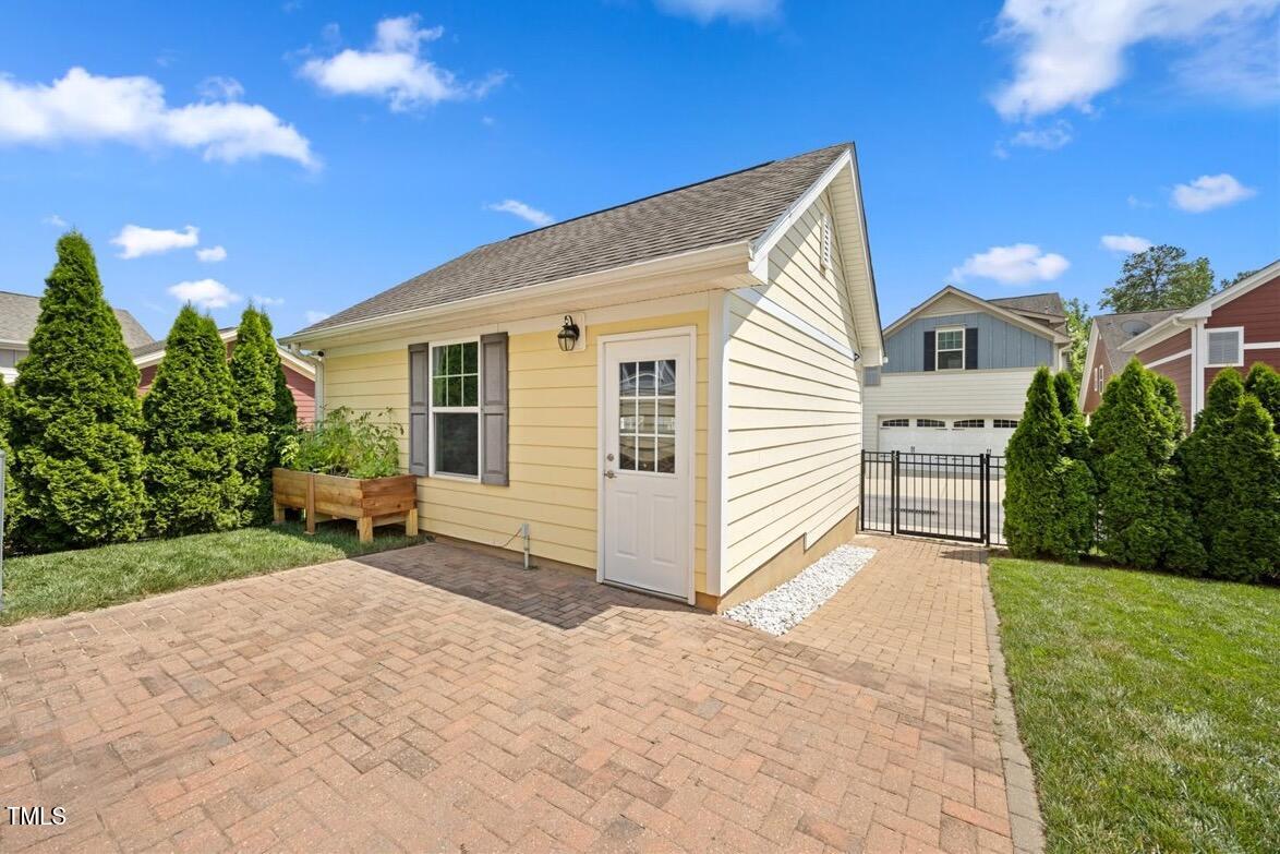 1330 Rodessa Raleigh, NC 27607 - Photo 26 of 28 Back Patio & Garage