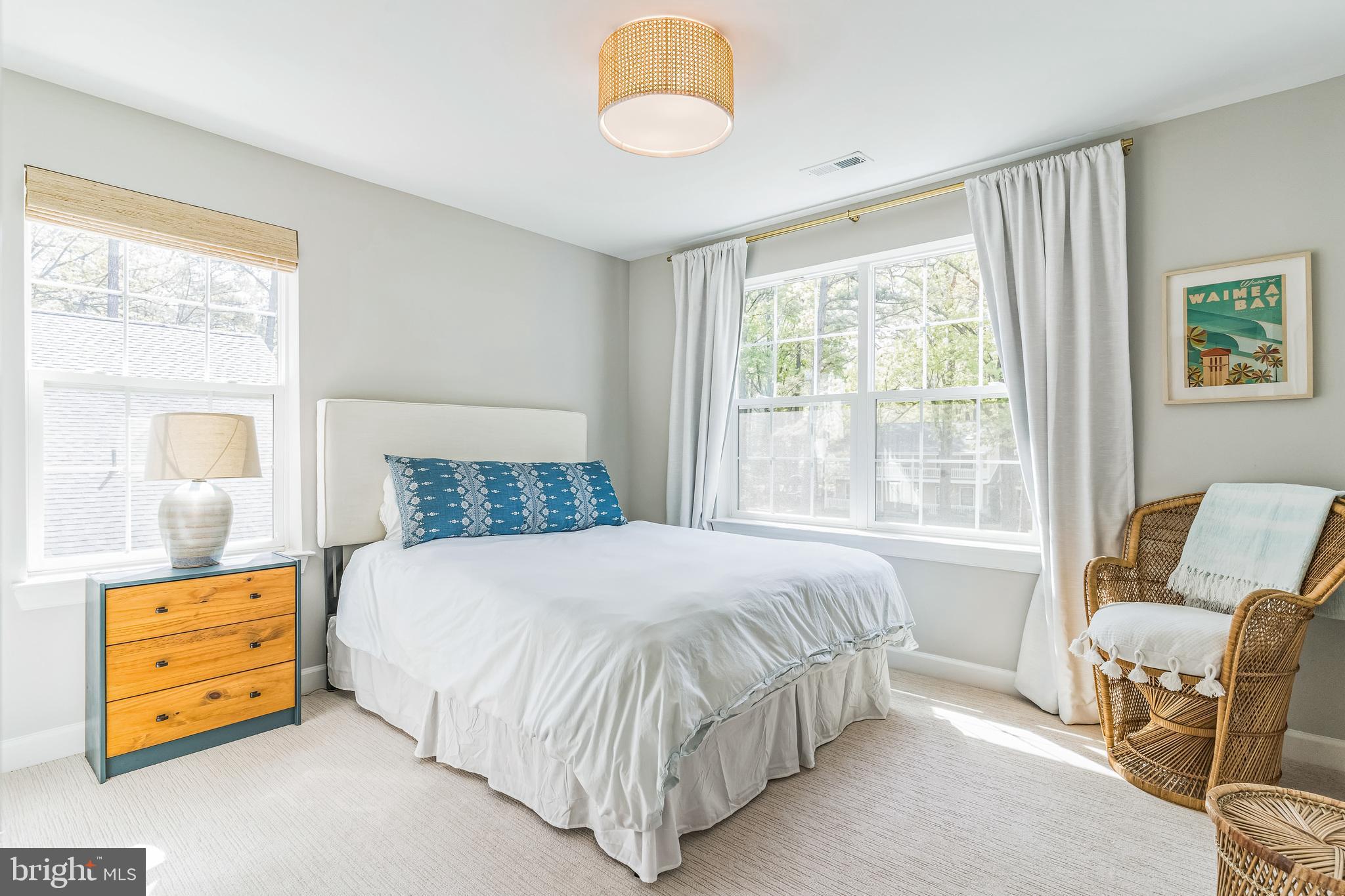 14720 Locust Court Issue, MD 20645 - Photo 18 of 42 a bedroom with a bed and a window