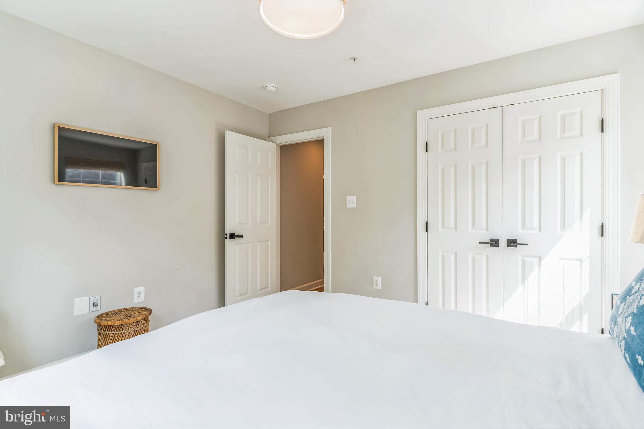 14720 Locust Court Issue, MD 20645 - Photo 19 of 42 a bedroom with a bed and a area