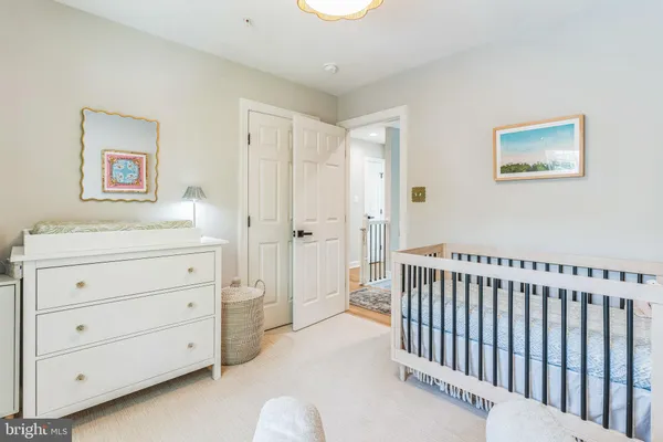 a view of a hallway with closet area