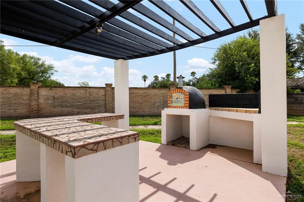5344 East Mile 4 Road Mission, TX 78573 - Photo 19 of 22 a view of an outdoor kitchen