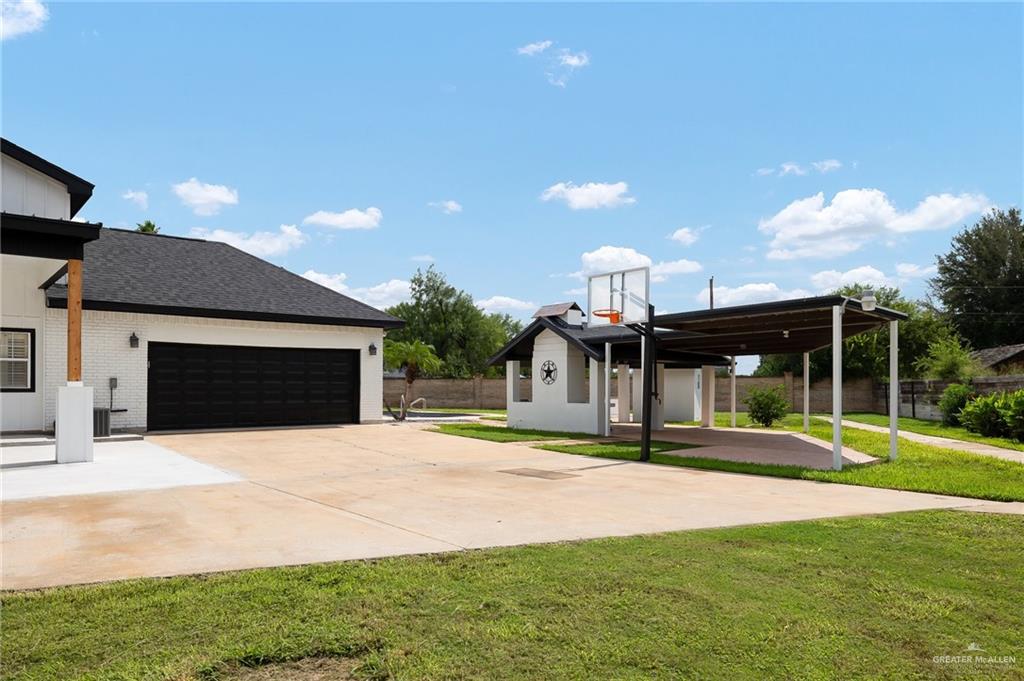 5344 East Mile 4 Road Mission, TX 78573 - Photo 22 of 22 a front view of building with yard