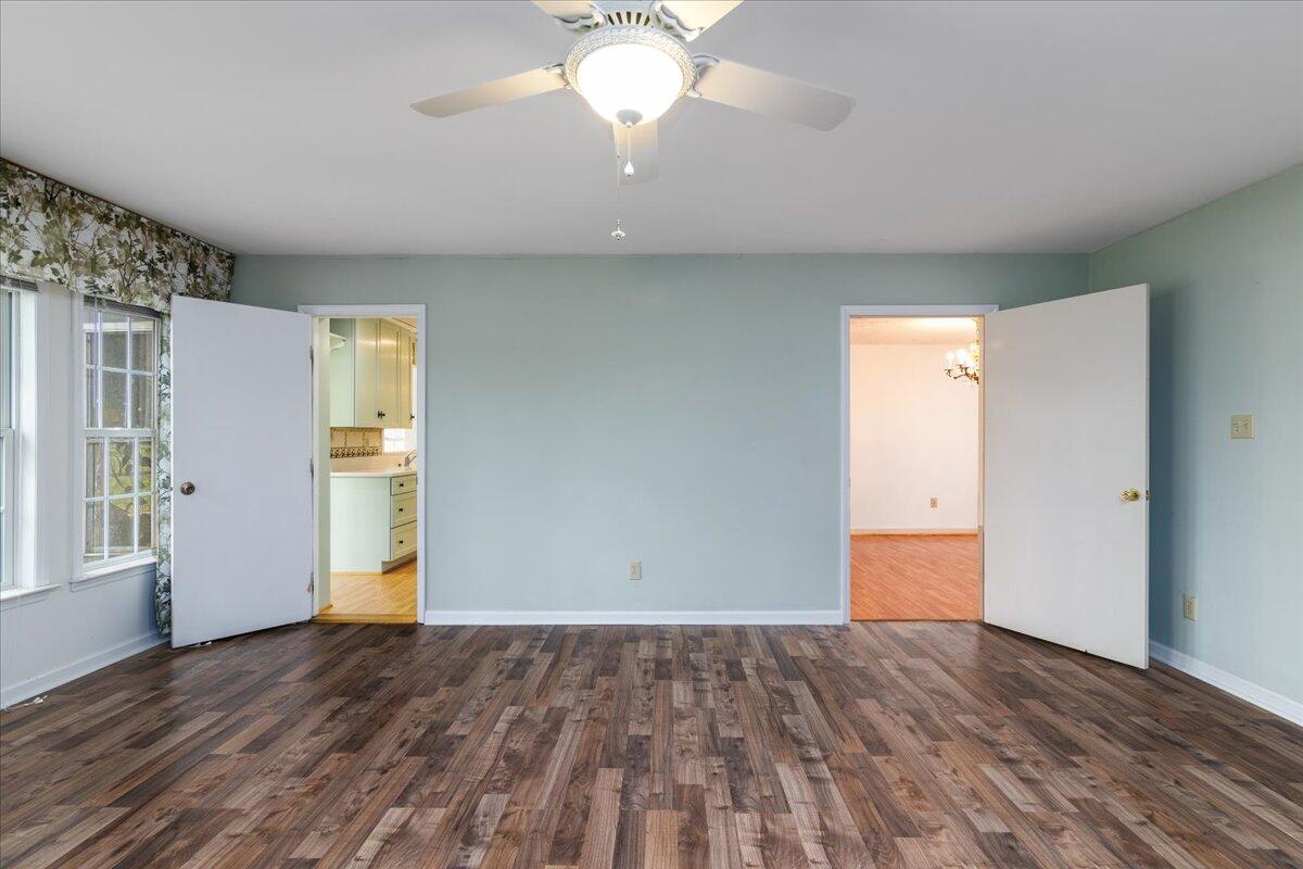 264 Pine Knob Circle Moneta, VA 24121 - Photo 26 of 67 a view of an empty room with wooden floor and a window