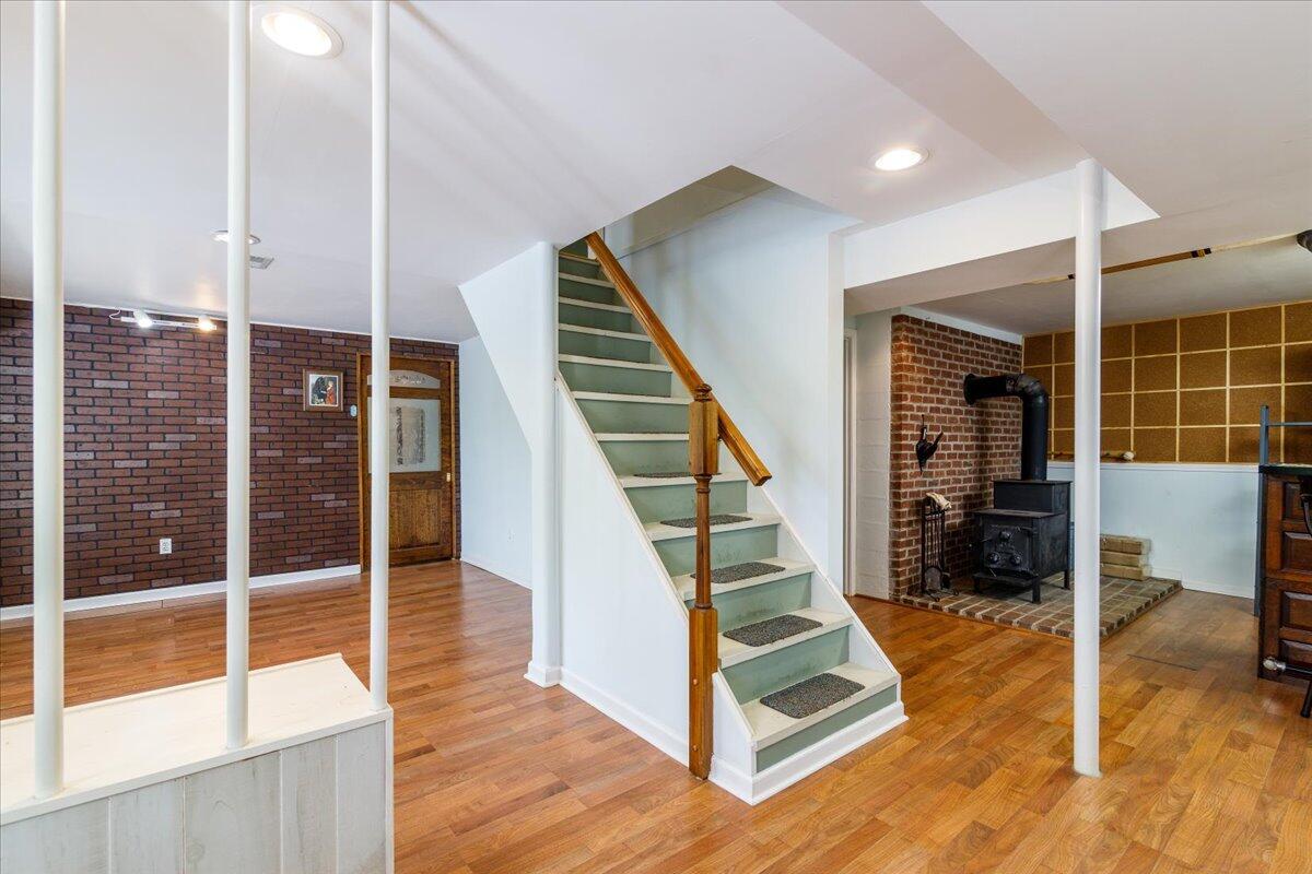 264 Pine Knob Circle Moneta, VA 24121 - Photo 37 of 67 a view of staircase with white walls and windows