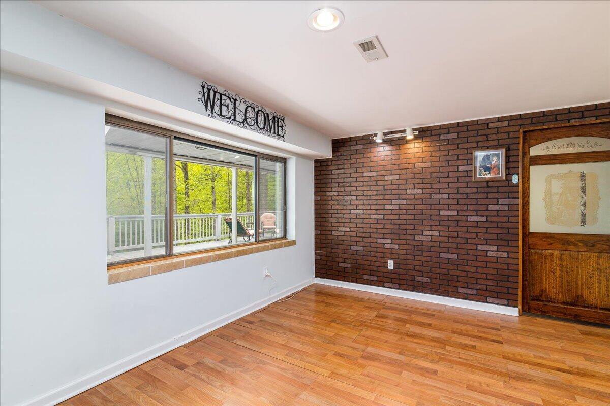 264 Pine Knob Circle Moneta, VA 24121 - Photo 38 of 67 a view of an empty room with a window