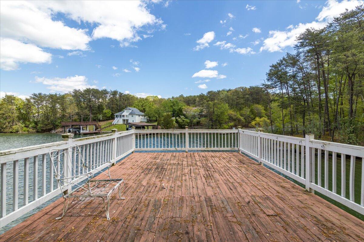 264 Pine Knob Circle Moneta, VA 24121 - Photo 51 of 67 a view of balcony with wooden floor and fence