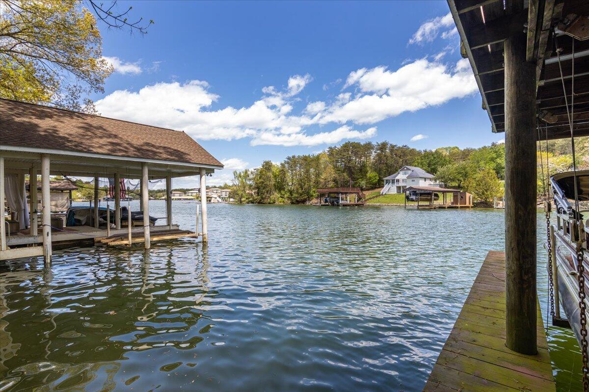 264 Pine Knob Circle Moneta, VA 24121 - Photo 55 of 67 a swimming pool view with a lake view
