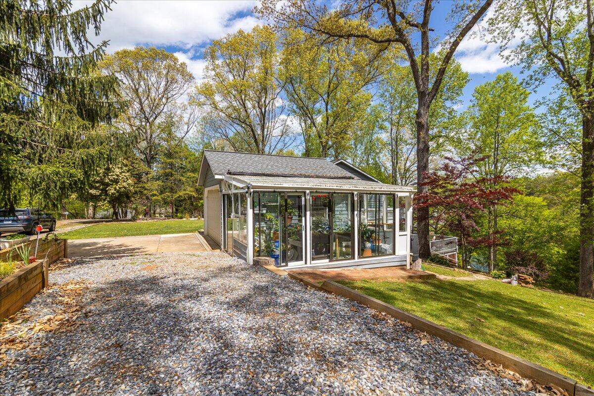 264 Pine Knob Circle Moneta, VA 24121 - Photo 7 of 67 a view of a house with backyard and trees