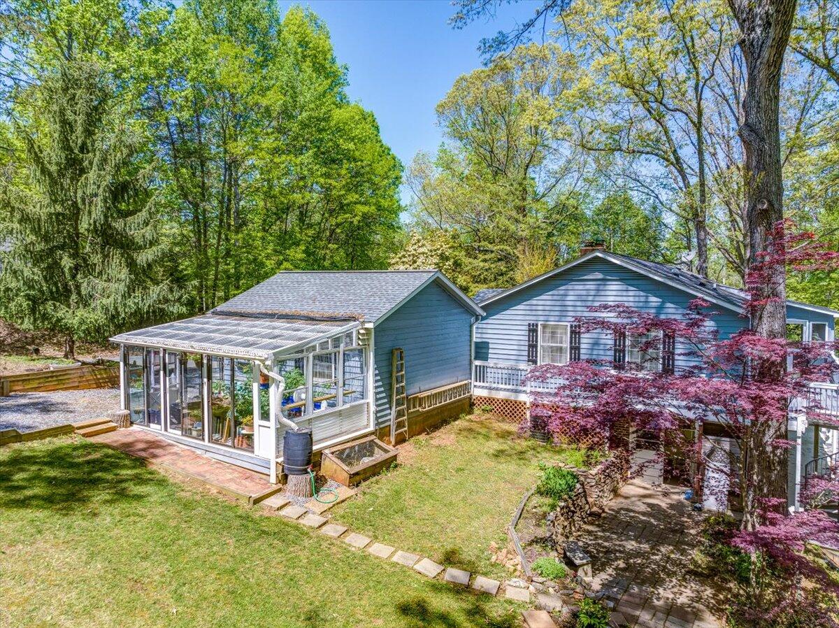 264 Pine Knob Circle Moneta, VA 24121 - Photo 8 of 67 a view of a house with a yard balcony and wooden fence