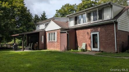 22 Old Mill Road Poughkeepsie, NY 12603 - Photo 3 of 18 a front view of a house with a yard