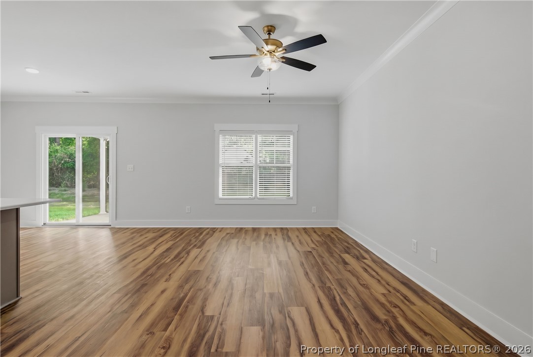 3931 Hamilton Street Hope Mills, NC 28348 - Photo 12 of 50 wooden floor in an empty room with a window