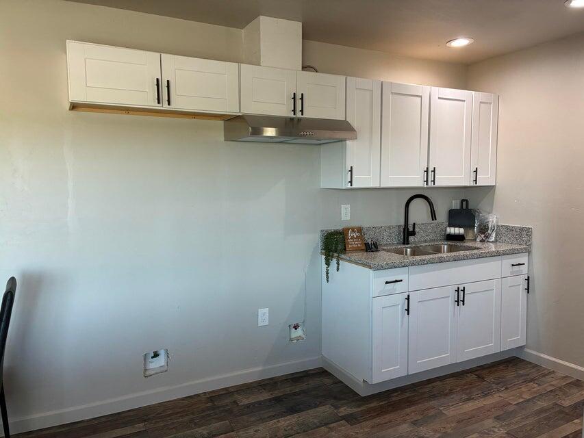 177 South Callison Road Tipton, CA 93272 - Photo 14 of 18 a kitchen with a sink and cabinets