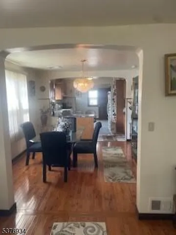 a view of a dining room with furniture