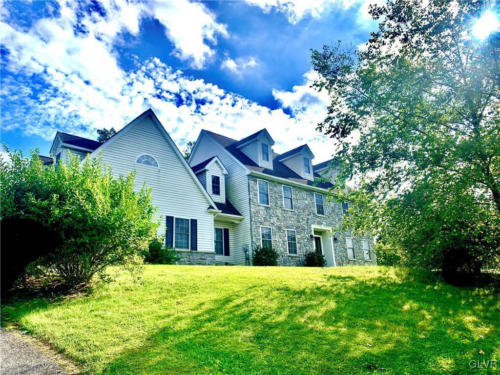 235 Valley View Road Hellertown, PA 18055 - Photo 3 of 41 a view of a house with yard and garden