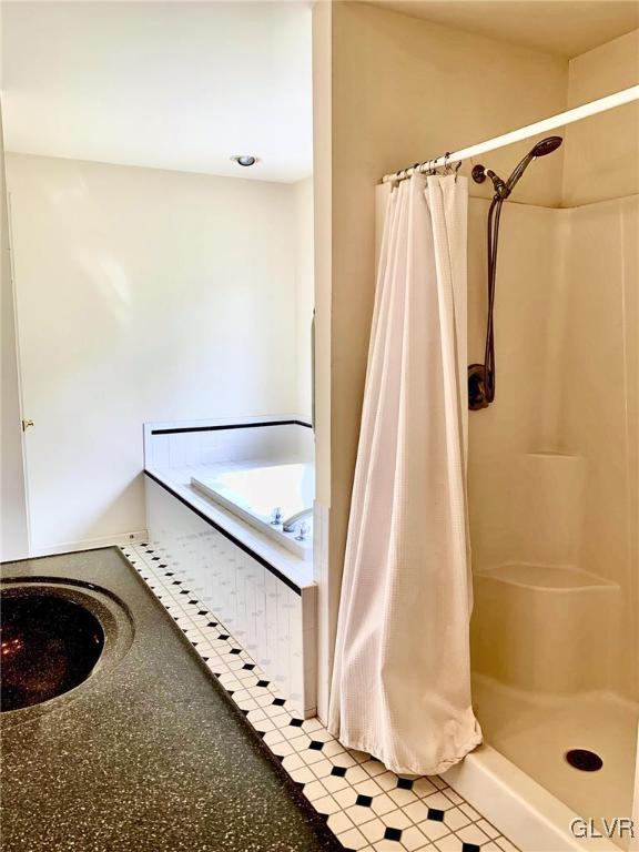 235 Valley View Road Hellertown, PA 18055 - Photo 34 of 41 a bathroom with a shower curtain and a window