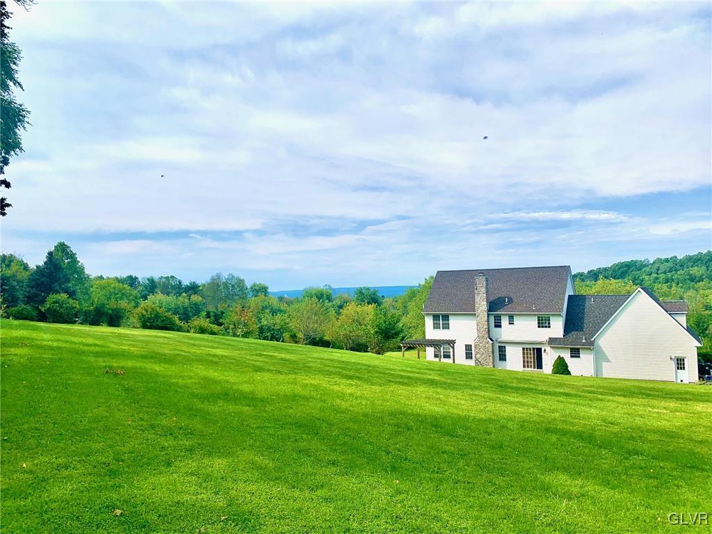 235 Valley View Road Hellertown, PA 18055 - Photo 5 of 41 a view of a house with a back yard