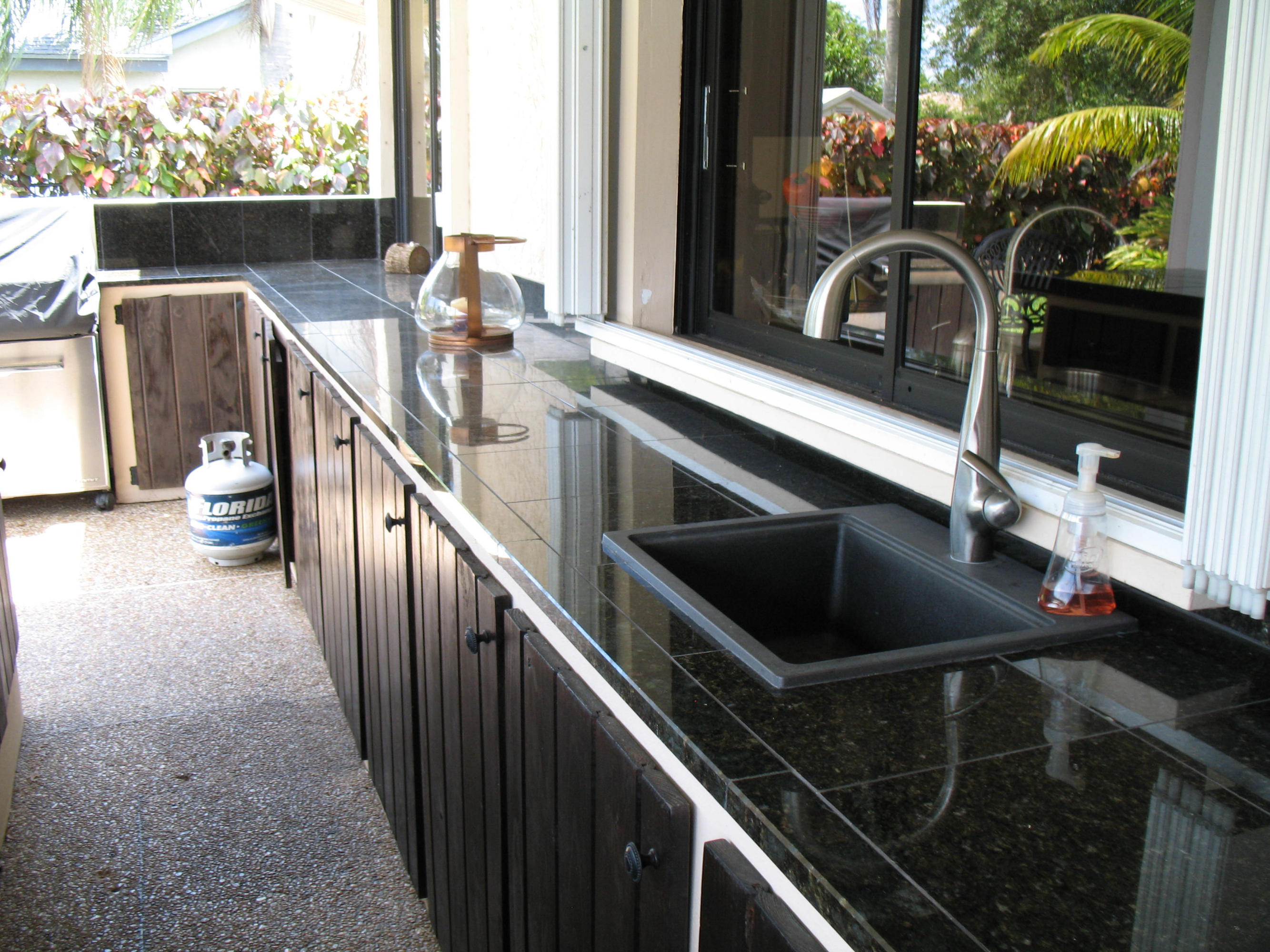 10297 185th Street South Boca Raton, FL 33498 - Photo 32 of 34 SUMMER KITCHEN W GRANITE COUNTERS