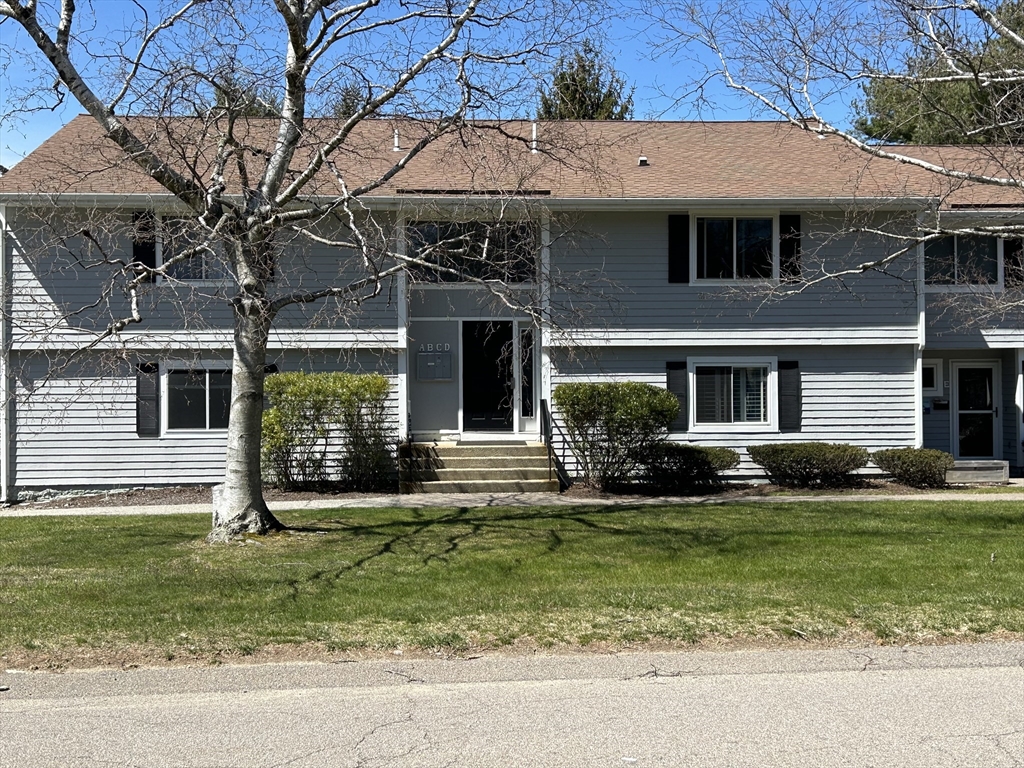 20 Beal's Cove Road, Unit A Hingham, MA 02043 - Photo 2 of 7 a view of a house with a yard porch and sitting area