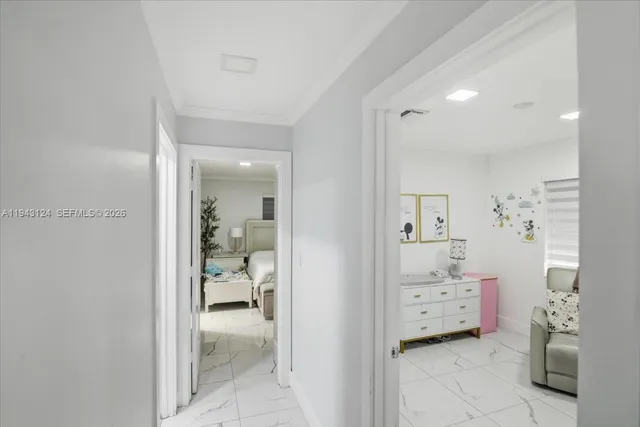 a en suite bathroom with a toilet sink and mirror