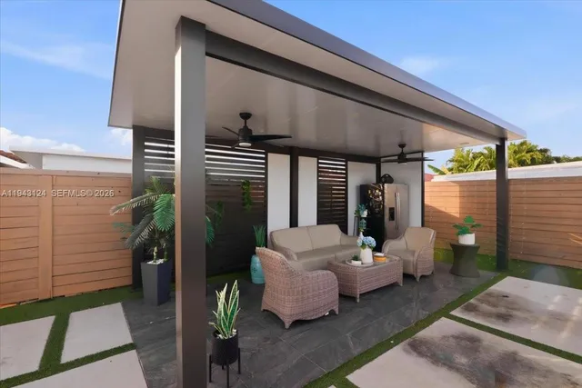 a outdoor space with patio couch and glass door