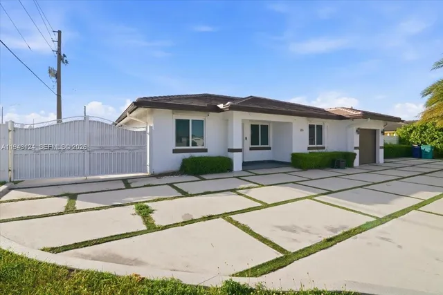 a view of a house with a patio