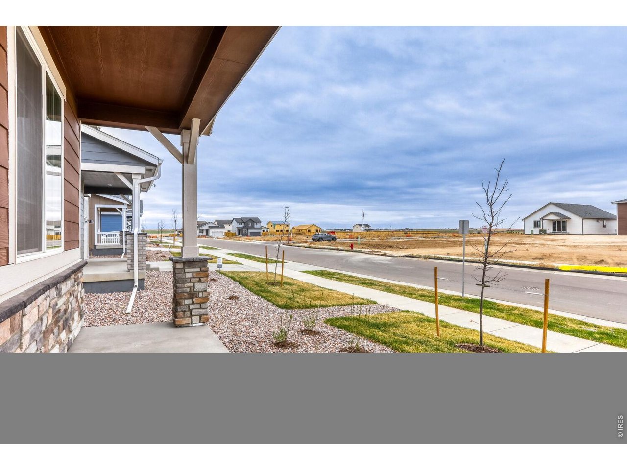 191 Buckwheat Lane Berthoud, CO 80513 - Photo 21 of 31 a view of a swimming pool with a lawn chairs