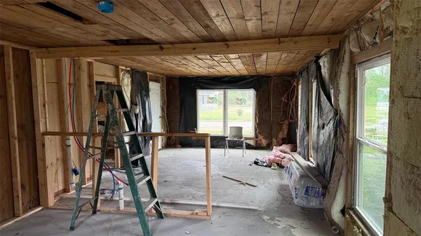 a view of a room with furniture