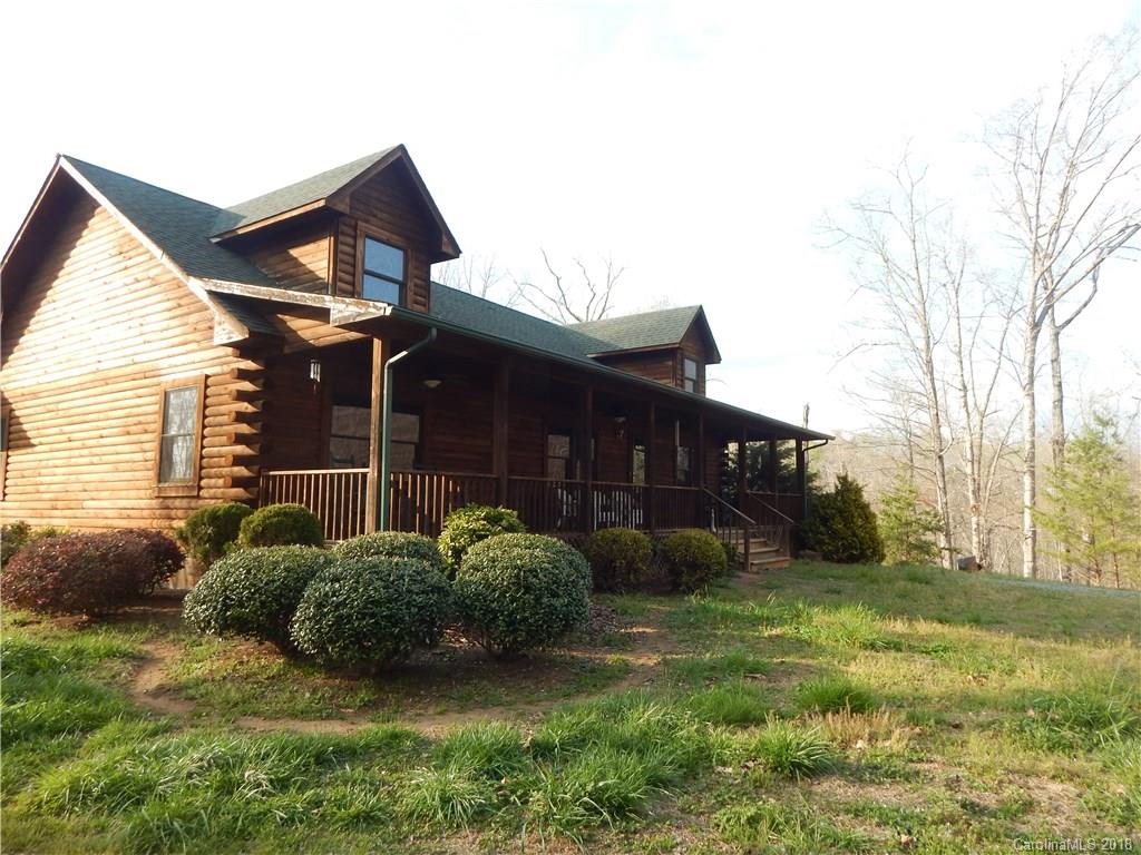 373 Pleasant Hill Loop Road Rutherfordton, NC 28139 - Photo 14 of 36 a view of a house with a yard