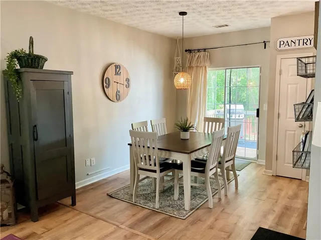 a kitchen with a refrigerator and countertop